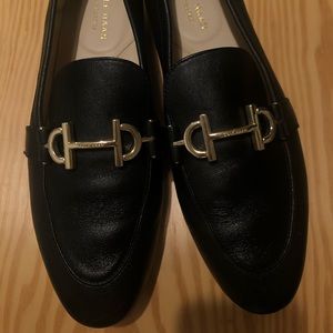 size 8, black with brown/tan bottoms, inside of shoe tan/beige, gold buckle